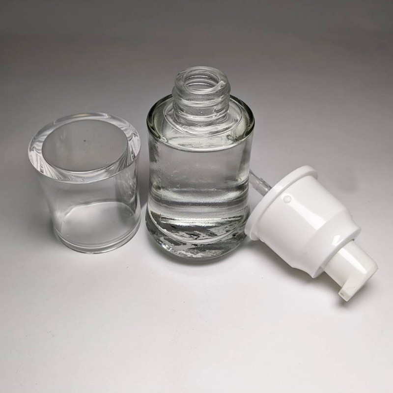 Product customization 30ml empty glass bottle with plastic lotion pump for facial lotion and foundation
