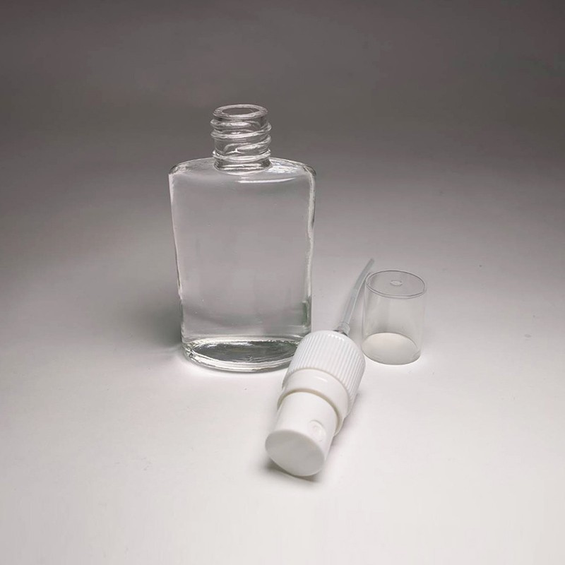 Multifunctional empty 35ml glass bottle unique shape with ribbed collar plastic mist sprayer