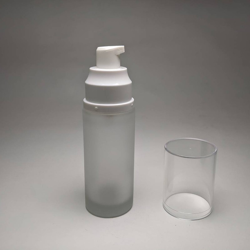 Pastel color glass bottle empty 50ml foundation packaging cylinder shape glass bottle with plastic lotion pump
