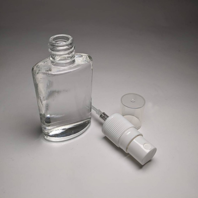 Best selling item 35ml empty oval shape glass bottle 18/415 neck size for travel skincare packaging