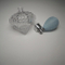 Fancy design 35ml capacity diamond shape semi transparent glass bottle with liquid bulb atomizer for fragrance packaging